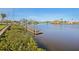 Scenic waterfront view with lush vegetation and dock in Gulf Harbors at 4052 Marine Pkwy, New Port Richey, FL 34652