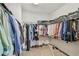 Large walk-in closet with ample storage and shelving at 4083 Woods Rider Loop, Odessa, FL 33556
