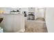 Open loft area with neutral carpet and railing features an aquarium and overlooks the stairs at 4083 Woods Rider Loop, Odessa, FL 33556