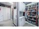 Beautiful walk-in closet featuring custom cabinetry and shelving for shoes, clothes, and accessories at 4197 Glade Wood Loop, New Port Richey, FL 34655