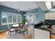 Charming dining area with a breakfast bar and window overlooking the backyard at 4351 Mallard Lake Dr, Spring Hill, FL 34609