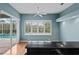 Bright kitchen featuring granite countertops and views of the outdoor pool at 4351 Mallard Lake Dr, Spring Hill, FL 34609