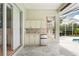 Outdoor kitchen and patio area offering a sink and mini fridge at 4351 Mallard Lake Dr, Spring Hill, FL 34609