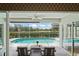 Inviting outdoor area with pool and patio furniture overlooking a golf course at 4351 Mallard Lake Dr, Spring Hill, FL 34609