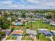 Aerial view of home in a well-kept neighborhood with communal amenities at 4567 Great Lakes S Dr, Clearwater, FL 33762