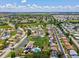 Aerial view of home and community, with a mix of residential and commercial areas nearby at 4567 Great Lakes S Dr, Clearwater, FL 33762