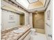 Retro bathroom featuring a tiled countertop and a shower-tub combo perfect for renovation at 4567 Great Lakes S Dr, Clearwater, FL 33762