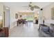 Open concept view of dining room with table and chairs, looking out to a spacious yard at 4567 Great Lakes S Dr, Clearwater, FL 33762