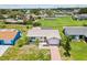 Charming single Gathering home featuring a well-manicured lawn and inviting curb appeal at 4567 Great Lakes S Dr, Clearwater, FL 33762
