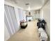 Spacious basement area with ample storage, laundry, and a bonus shower room at 4628 Irene Loop, New Port Richey, FL 34652
