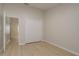 Spacious bedroom with light-colored walls, closet, and light wood flooring at 4752 Weasel Dr, New Port Richey, FL 34653