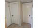 Hallway featuring closet and bedroom door at 4853 Alcea St, New Port Richey, FL 34652