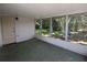 Screened-in patio offering relaxing outdoor space and view of nature at 4853 Alcea St, New Port Richey, FL 34652