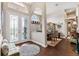 Elegant foyer featuring beautiful flooring, stylish decor, and a welcoming ambiance at 5121 Delacroix Dr, Brooksville, FL 34604