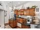 Beautiful kitchen showcasing wood cabinets, a central island, and modern appliances at 5121 Delacroix Dr, Brooksville, FL 34604
