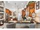 Elegant kitchen with a breakfast bar featuring granite counters and stylish bar seating at 5121 Delacroix Dr, Brooksville, FL 34604
