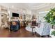 Spacious living room with a bar area, comfortable seating, and an open layout at 5121 Delacroix Dr, Brooksville, FL 34604
