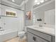 Bathroom with a tub, shower, and modern finishes at 6130 Colmar Pl, Apollo Beach, FL 33572