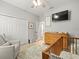 Comfortable Bedroom features a changing table, crib, and soft rug to create a warm environment at 6130 Colmar Pl, Apollo Beach, FL 33572