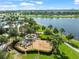 Community amenities including a playground and splashpad by the lake offer fun for the whole Gathering at 6130 Colmar Pl, Apollo Beach, FL 33572