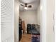 Storage room with laminate flooring and a ceiling fan at 6282 Darien Way, Spring Hill, FL 34606