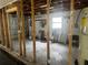 Unfinished basement area showing structural supports and potential at 6826 Driftwood Dr, Hudson, FL 34667
