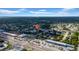 Wide aerial view showing community near shopping area at 7133 Box Elder Dr, Port Richey, FL 34668