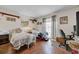 Bright bedroom with hardwood floors and dual beds at 7133 Box Elder Dr, Port Richey, FL 34668