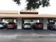 Covered parking area with assigned spaces near the building entrance, offering convenience and protection from the elements at 7614 Radcliffe Cir # B213, Port Richey, FL 34668