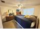 Comfortable main bedroom with a dresser and a soft carpet at 8312 Split Rail Ln, Hudson, FL 34667