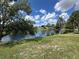 Scenic view of the water offering tranquil surroundings and natural beauty, enhancing the property's appeal at 8312 Split Rail Ln, Hudson, FL 34667