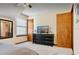 Comfortable bedroom featuring soft carpet, simple decor, and ample natural light at 952 Coachlight Ln, Brooksville, FL 34601