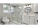 Updated bathroom with glass enclosed shower, stylish vanity, and modern fixtures at 9921 San Mateo Way, Port Richey, FL 34668