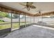 Spacious screened-in patio perfect for outdoor dining and entertaining guests at 10091 Bannister St, Spring Hill, FL 34608