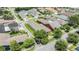 Aerial view of the home situated in a neighborhood with lush greenery at 10115 Ringling St, New Port Richey, FL 34655