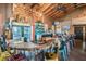 Full-service bar area with an extensive drink selection, ample seating, and televisions at 10115 Ringling St, New Port Richey, FL 34655