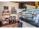Charming cafe area with coffee service, display case and locally sourced treats at 10115 Ringling St, New Port Richey, FL 34655