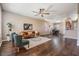 Inviting living room with hardwood floors, ceiling fan, and stylish furnishings at 10115 Ringling St, New Port Richey, FL 34655