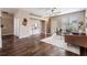 Spacious living room with hardwood floors, ample natural light, and an open layout perfect for entertaining at 10115 Ringling St, New Port Richey, FL 34655
