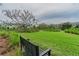 Scenic park view with bench seating and lush landscaping for relaxation at 10115 Ringling St, New Port Richey, FL 34655