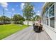 This backyard deck and dining area is the perfect extension to the living space for outdoor entertaining and relaxing at 1071 Lexington Ct, Largo, FL 33771