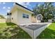 The backyard boasts a large, updated deck area perfect for entertaining or relaxing at 1071 Lexington Ct, Largo, FL 33771
