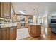 Kitchen with stainless steel appliances, granite countertops, and wooden cabinets at 1071 Lexington Ct, Largo, FL 33771