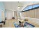 Bright sunroom featuring tile flooring, neutral walls, and large windows and doors for plenty of light at 1071 Lexington Ct, Largo, FL 33771