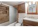 Bathroom showcasing modern vanity, decorative tile accents, and a shower with glass doors at 1131 Bentley Ave, Spring Hill, FL 34608
