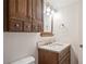 Bathroom featuring modern vanity, decorative tile accents, and updated fixtures at 1131 Bentley Ave, Spring Hill, FL 34608
