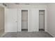 Bedroom closet with open sliding doors and built-in shelving for storage at 1131 Bentley Ave, Spring Hill, FL 34608