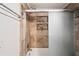 Close-up of the shower, displaying decorative tile accents, and modern glass doors at 1131 Bentley Ave, Spring Hill, FL 34608