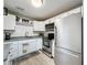 Modern kitchen with stainless steel appliances and white subway tile backsplash at 11722 Carissa Ln # 49A, New Port Richey, FL 34654