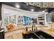 Granite countertops and a view into the Gathering room create an inviting kitchen space at 12295 Clarendon Ct, Spring Hill, FL 34609